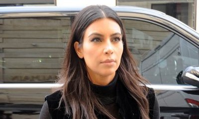 Kim Kardashian Posts Essay to Defend Herself Against Criticisms Over Nude Photos
