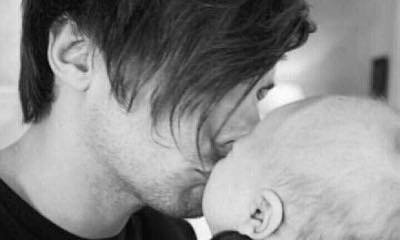 Louis Tomlinson Gives His Son Sweet Kiss as the Baby Turns Two Months Old