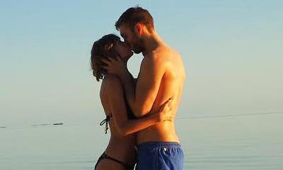 Taylor Swift and Calvin Harris Share Steamy Kiss on the Beach