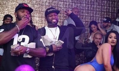 50 Cent Pictured Holding Stacks of Money at Strip Club Despite Bankruptcy Filing