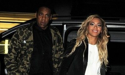 Beyonce Steps Out With Jay-Z Wearing Bright Yellow Pants and Tiny Lemon Sticker on Her Phone