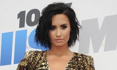 Demi Lovato in Good Spirits When Making First Post-Breakup Appearance at UFC Match
