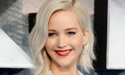 Jennifer Lawrence Goes Braless, Knocks Back Champagne at Friend's Wedding