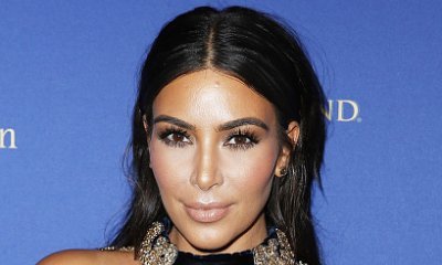 Kim Kardashian Strips Down to White Undies on National Selfie Day