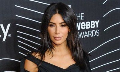 Kim Kardashian Teases 'Secret Project' With a Bootylicious Pic