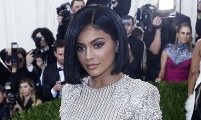 Kylie Jenner Suffers Wardrobe Malfunction in Racy Dress - Find Out How She Fixes It!