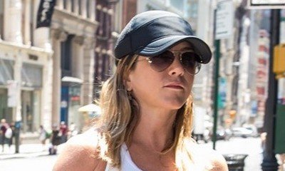 Jennifer Aniston Bares Her Boobs While Sunbathing in Italy