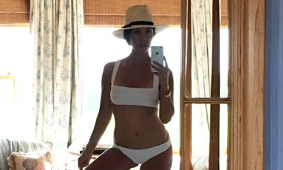 Kourtney Kardashian Makes Fun of Her Height While Posing in Sexy Bikini