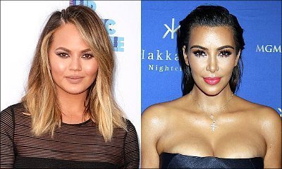 Chrissy Teigen Sends Kim K. Flowers for Broken BlackBerry, Says She's 'So Sorry' for the Loss