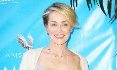 Sharon Stone's Nipple Slips Out of Her Tiny Bikini During a Beach Trip