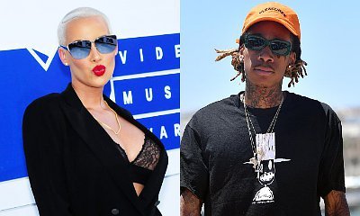 Amber Rose and Wiz Khalifa Are Feuding on Twitter After Her Threesome Confession