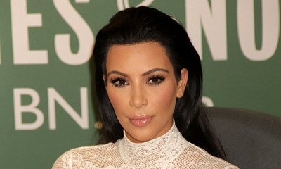 Kim Kardashian Ditches Bra in Skintight Metallic Outfit