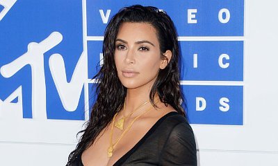 Kim Kardashian Goes Completely Nude Again While Getting Midnight Spray Tan
