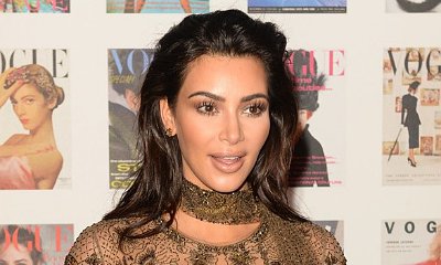 Kim Kardashian Has a Lot to Show Off in This Super Sheer Bra and Clear Plastic Boots