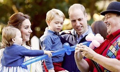This Picture of Princess Charlotte Snuggling a Bunny at Playdate in Canada Is Just Too Cute