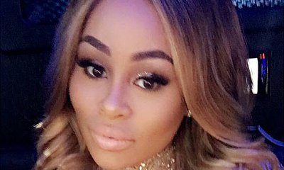 Blac Chyna Looks Gorgeous in Sheer Gold Dress for Her Baby Shower. Get the Details!