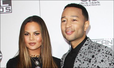 How John Legend Reacts to Chrissy Teigen's Wardrobe Malfunction at AMAs