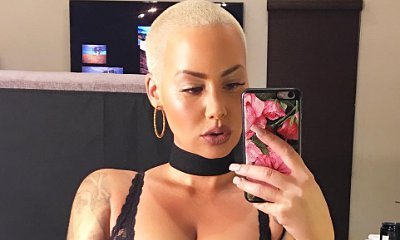 Amber Rose Flaunts Ample Cleavage in Body-Baring Jumpsuit. See the Pic!