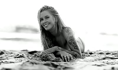 Ireland Baldwin Dances in the Ocean Completely Topless in Latest Love Advent Video