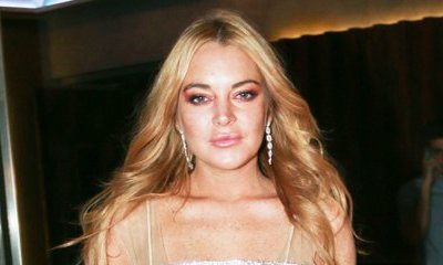 Lindsay Lohan Spotted Getting 'Affectionate' With a Mystery Man