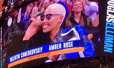 Amber Rose Left Blushing After Beau Val Chmerkovkiy Kisses Her at NY Knicks Game