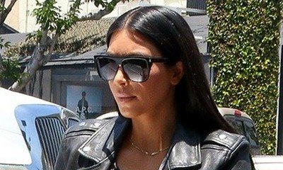 Baby No. 3 on the Way? Kim Kardashian Spotted Cradling Her Tummy While Leaving OB-GYN
