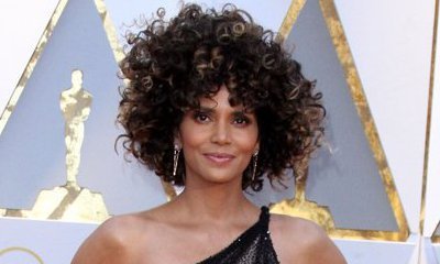Halle Berry Rocks Big Curly Locks at the Academy Awards