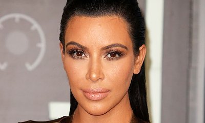 Kim Kardashian Accused of Getting Cheek Implants