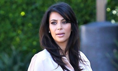 Kim Kardashian Laughs Off Third Pregnancy Rumors