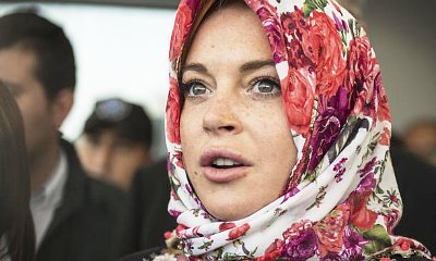 Lindsay Lohan Claims She Was 'Racially Profiled' for Wearing Headscarf at Airport
