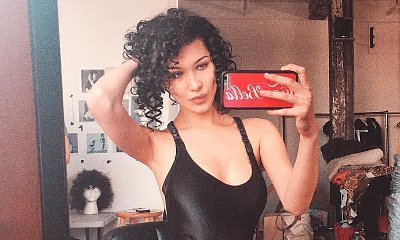 Bella Hadid Debuts Curly Locks as She Sizzles in Sexy Swimsuit - See Her New Look