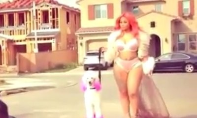 Blac Chyna Flaunts Her Ample Assets in Furry Bikini During Cosmopolitan Photoshoot