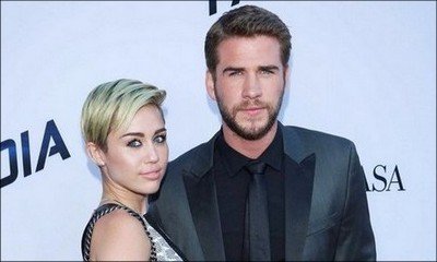 Did Miley Cyrus Elope With Liam Hemsworth? Dad Shares Pic of Her in White Dress