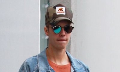 Justin Bieber Spotted Cuddling Up to a Mystery Brunette After Brazilian Concert