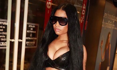 Nicki Minaj Shows Off Enviable Curves in Bra and Racy Fringed Skirt at Paris Fashion Week