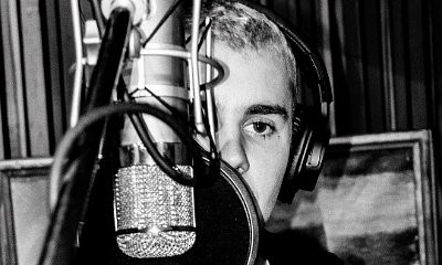 Justin Bieber Teases New Music With Studio Photos