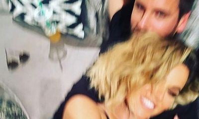 Khloe Kardashian Hits Back at Hater Over Cuddly Pic With Scott Disick