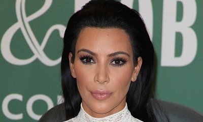Kim Kardashian Flaunts Her Tempting Figure in These Bedazzled 'Bedtime' Bikini Snaps