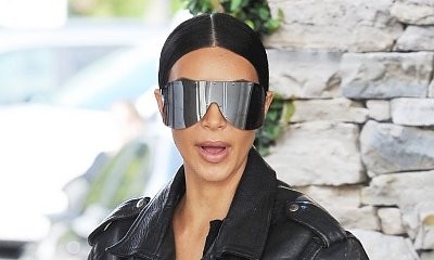 Still Traumatized? Kim Kardashian Looks Frightened When a Mystery Man Crashes Into Her