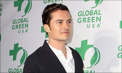 Orlando Bloom Caught Cozying Up to Sexy Model at Coachella