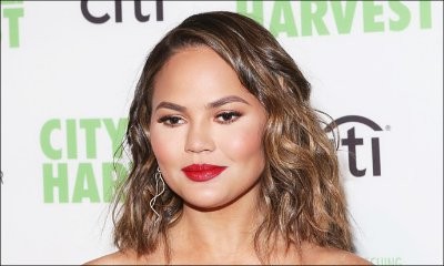 Chrissy Teigen Jokes About Getting Extensive Plastic Surgery: Everything Is Fake Except My Cheeks