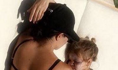 Kourtney Kardashian Cuddles Up to Son Reign in Skimpy Bikini