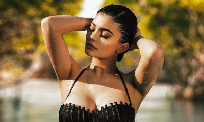 Kylie Jenner Gets Wet and Seductive in Sheer One-Piece - See the Sultry Pic!