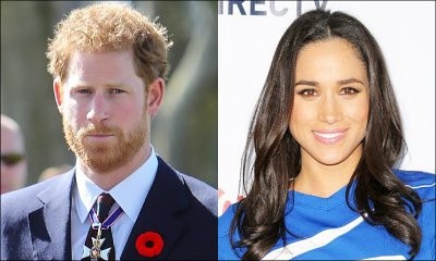 Prince Harry and Meghan Markle Spotted Sharing a Kiss in Public for the First Time
