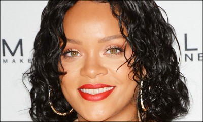 Rihanna Flaunts Cleavage and Chest Tattoo in Plunging Long Dress