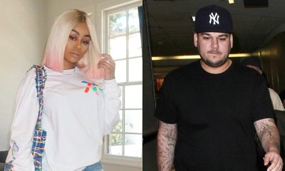 Blac Chyna Caught Kissing Mystery Man Amid Rob Kardashian Drama