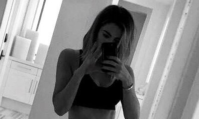 Khloe Kardashian Accused of Photoshopping Her Workout Pic. See It Yourself!