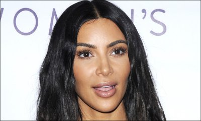 Kim Kardashian Flaunts Major Cleavage as She Wears Just a Sheer Bra and an Open Blazer