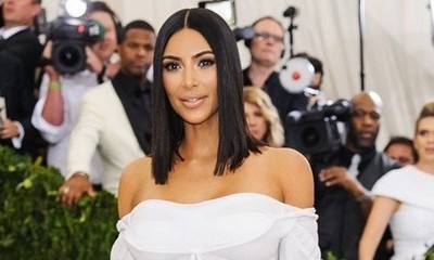 Kim Kardashian Bares Her Tiny Waist Three Months After Unflattering Cellulite Photos