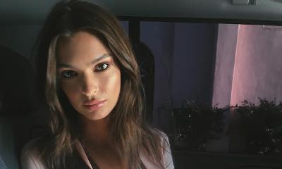 Emily Ratajkowski Poses Topless by the Pool in Cheeky Instagram Pic